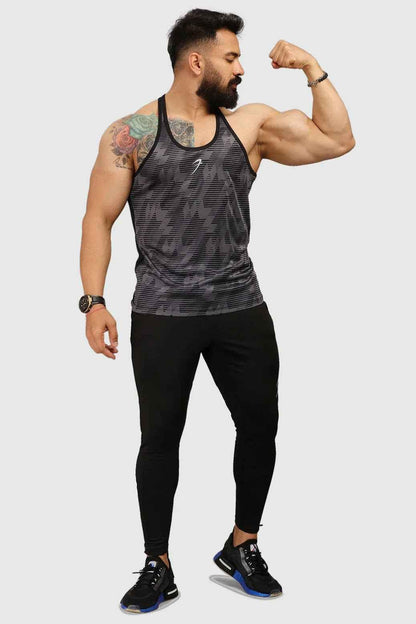 Fuaark NZ Amplify Stringer Tank Top in grey, lightweight fitness wear for men, with a fitted sleeveless design for workout comfort.