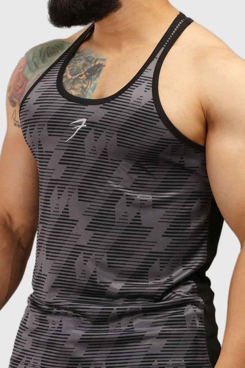 Fuaark Nz Amplify Stringer Tank Top in grey, lightweight fitness performance wear for men, featuring a fitted design and sleeveless style.