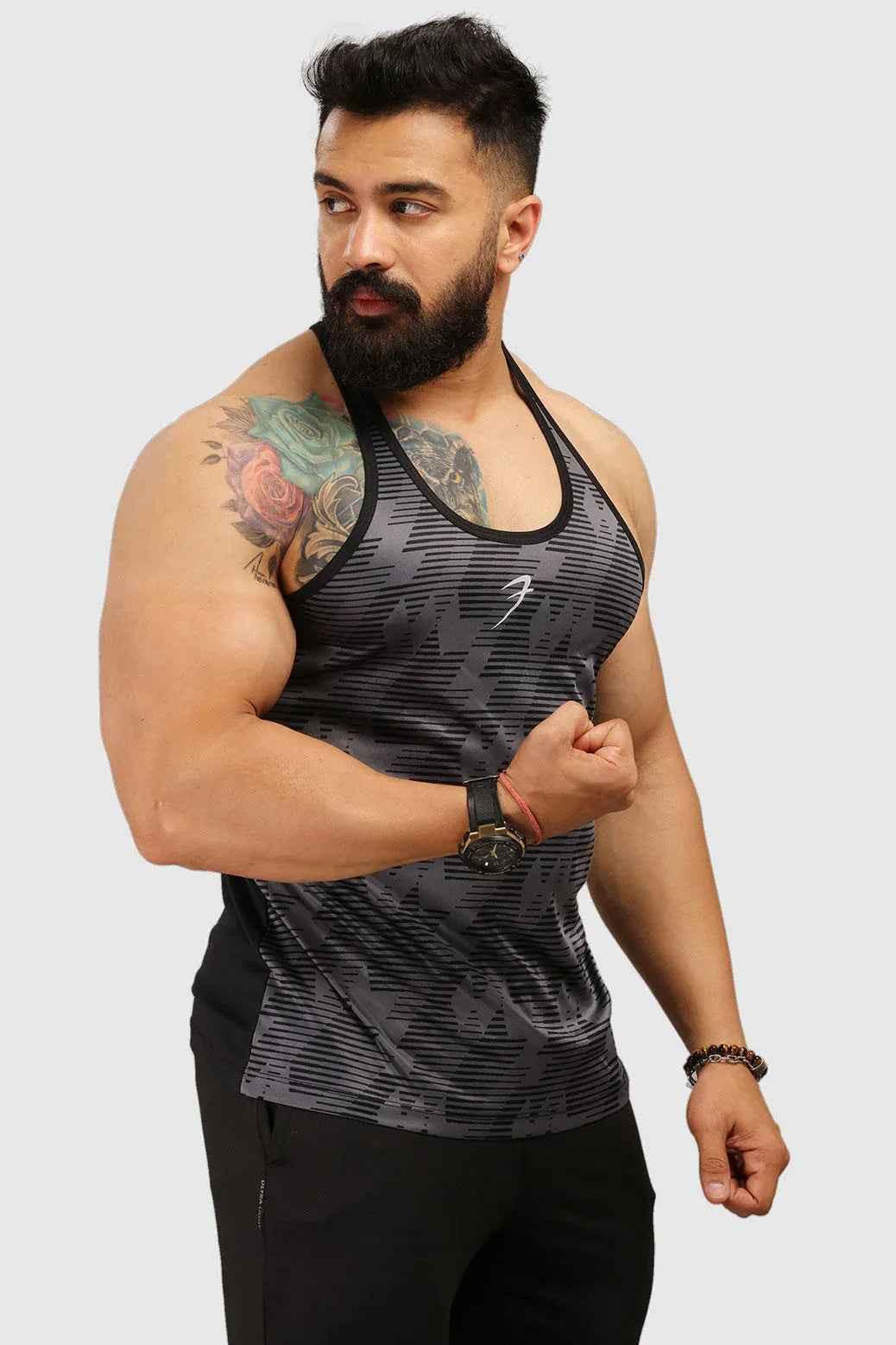 Grey Amplify Stringer Tank Top by Fuaark NZ, athletic fitness wear, sleeveless design for workout and training sessions.