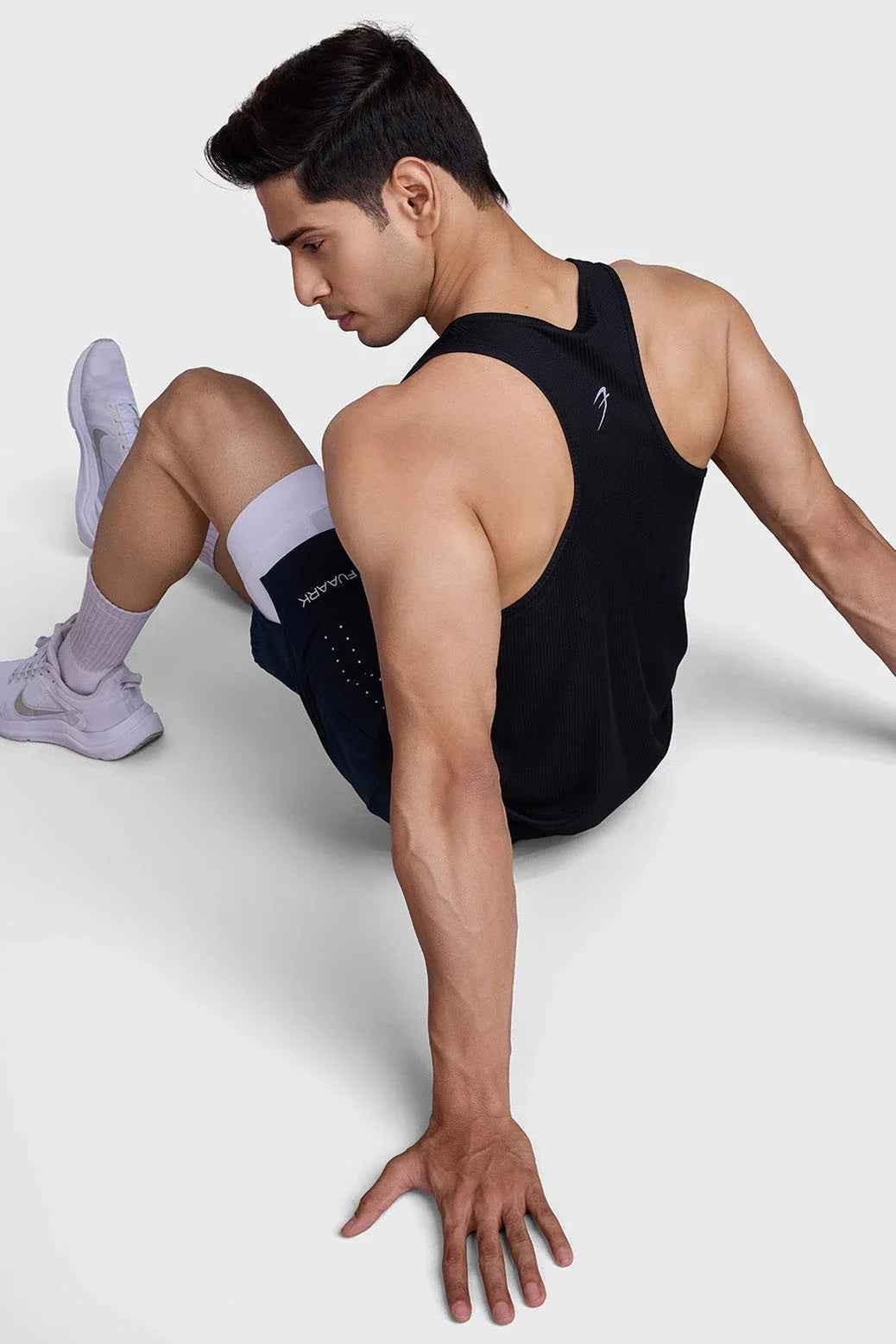 Black Fuaark Nz Checks Running Tank Top featuring a comfortable fit and stylish design for active wear.