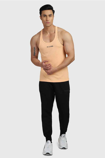 Fuaark Nz Checks Stringer Peach tank top featuring a sleeveless design with checkered pattern and peach color.