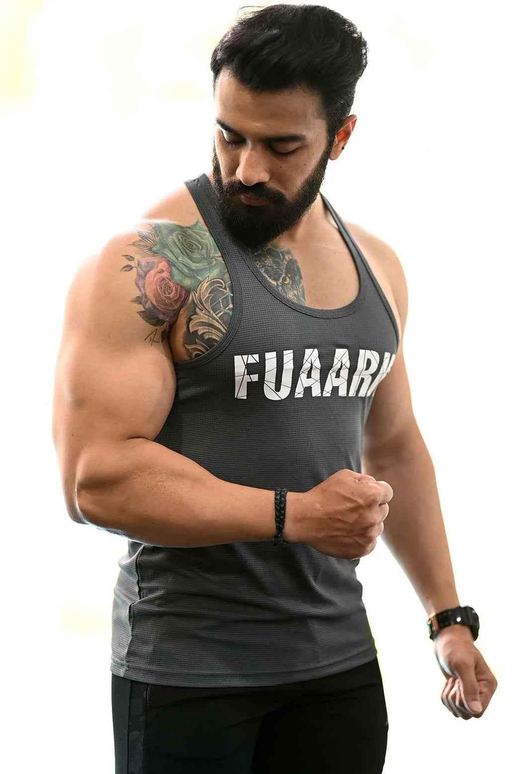 Grey Classic Stringer tank top by Fuaark Nz, featuring a fitted design and sleeveless style for athletic wear.