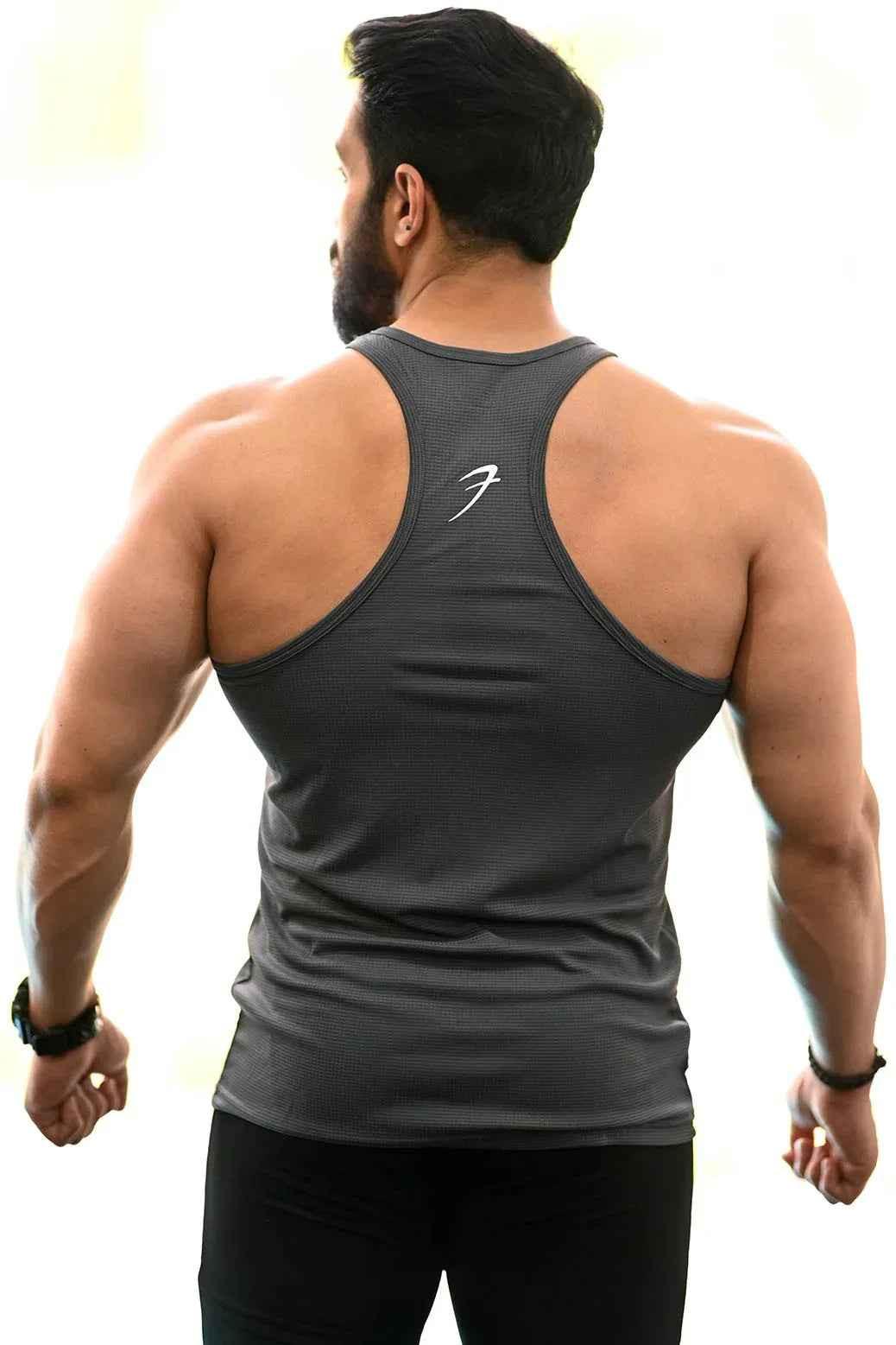 Grey Classic Stringer tank top by Fuaark Nz featuring a fitted sleeveless design and athletic style.