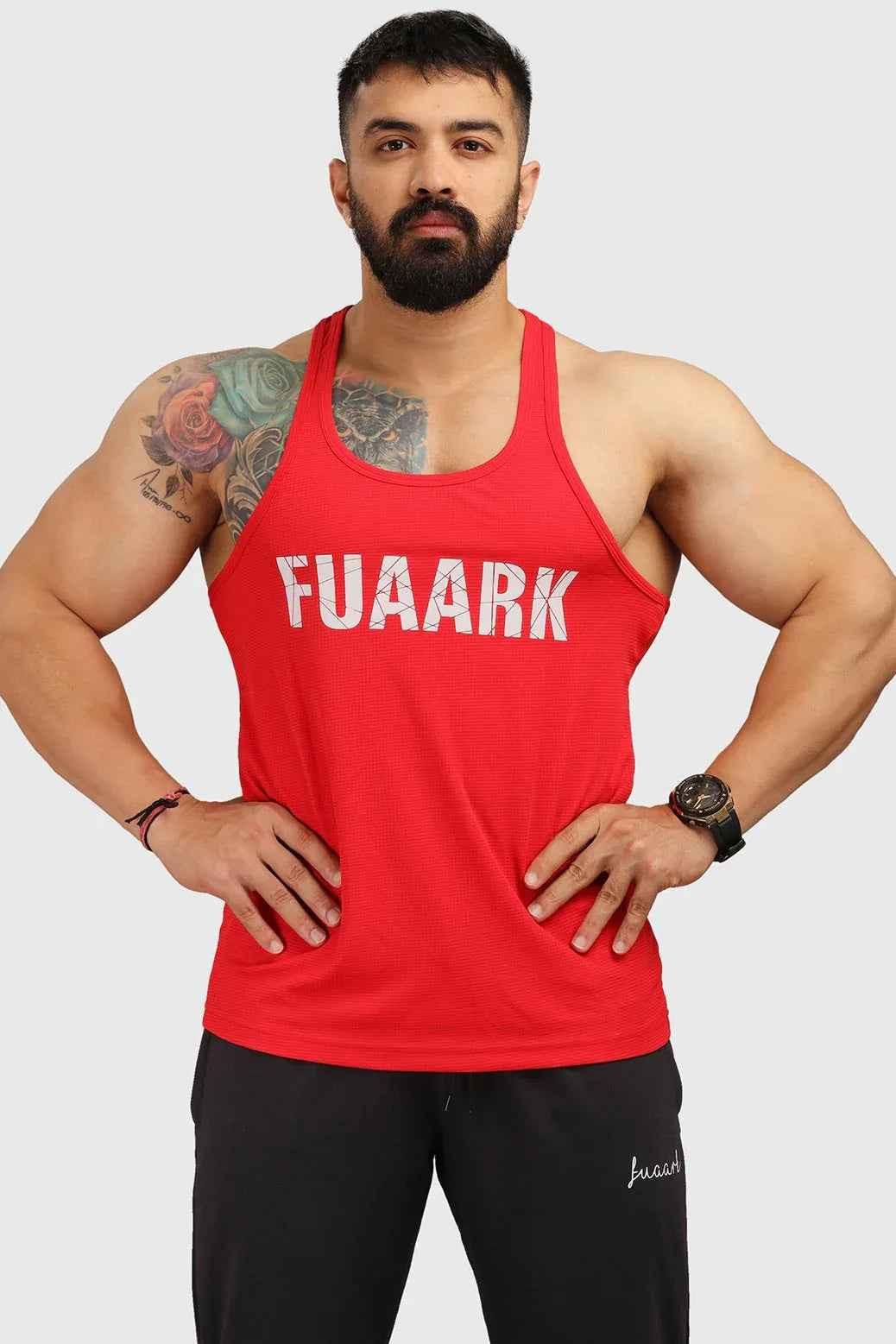 Red Classic Stringer tank top by Fuaark Nz, fitted sleeveless design with a scoop neckline and athletic style.