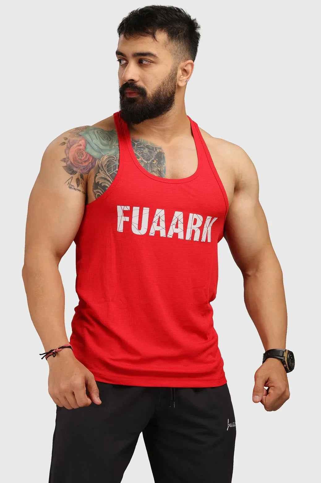 Red classic stringer tank top by Fuaark NZ, showing a fitted sleeveless design with thin shoulder straps.