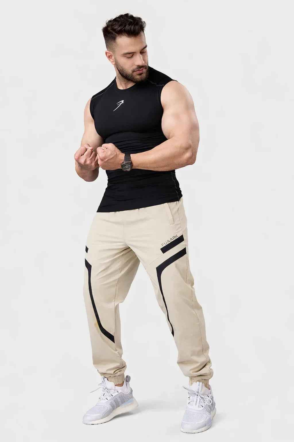 Black compression sleeveless tank top from Fuaark NZ, designed for active wear and athletic training.