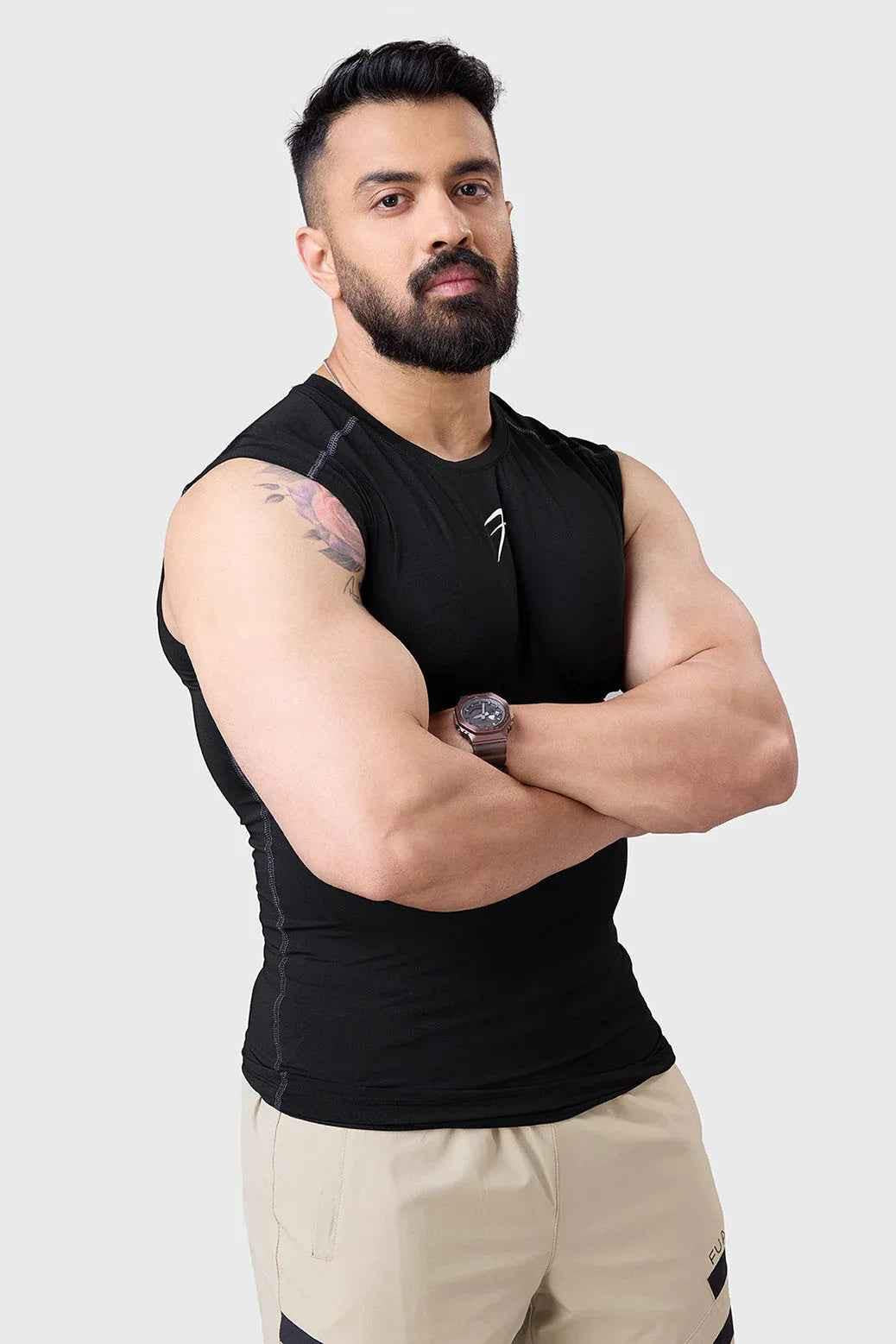 Black Fuaark Nz compression sleeveless tank top, close-up of fitted athletic tank shirt for men or women.
