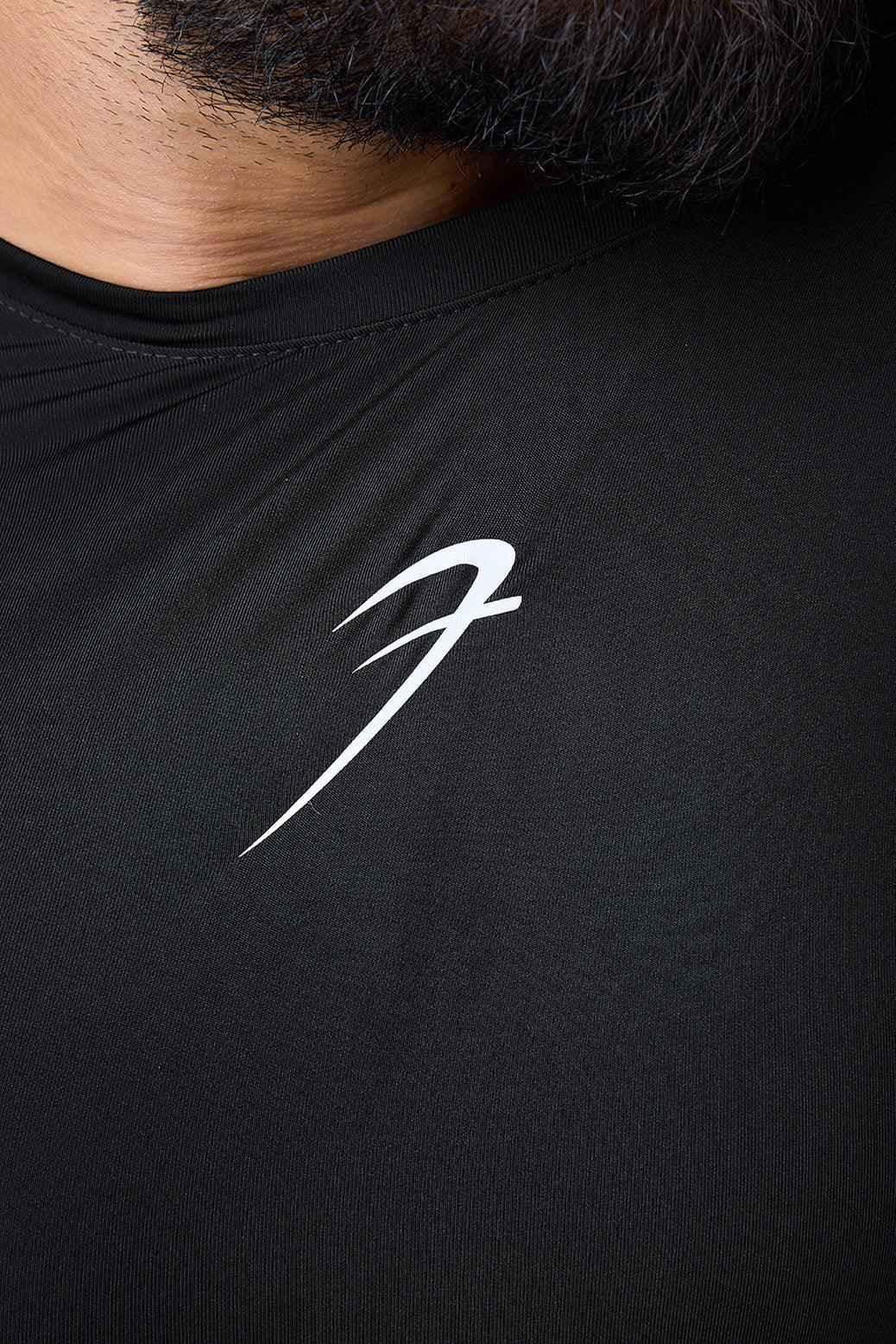 Black compression sleeveless tank top by Fuaark Nz, fitted and breathable for athletic or casual wear.