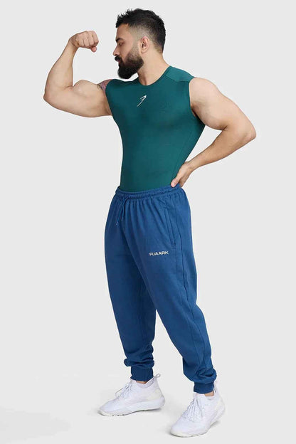 Emerald green compression sleeveless tank top by Fuaark Nz, fitted athletic tank top for workout and active wear.