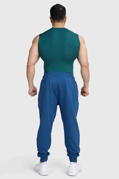 Emerald green Fuaark Nz compression sleeveless tank top, fitted athletic design, stretchy fabric for workout or casual wear