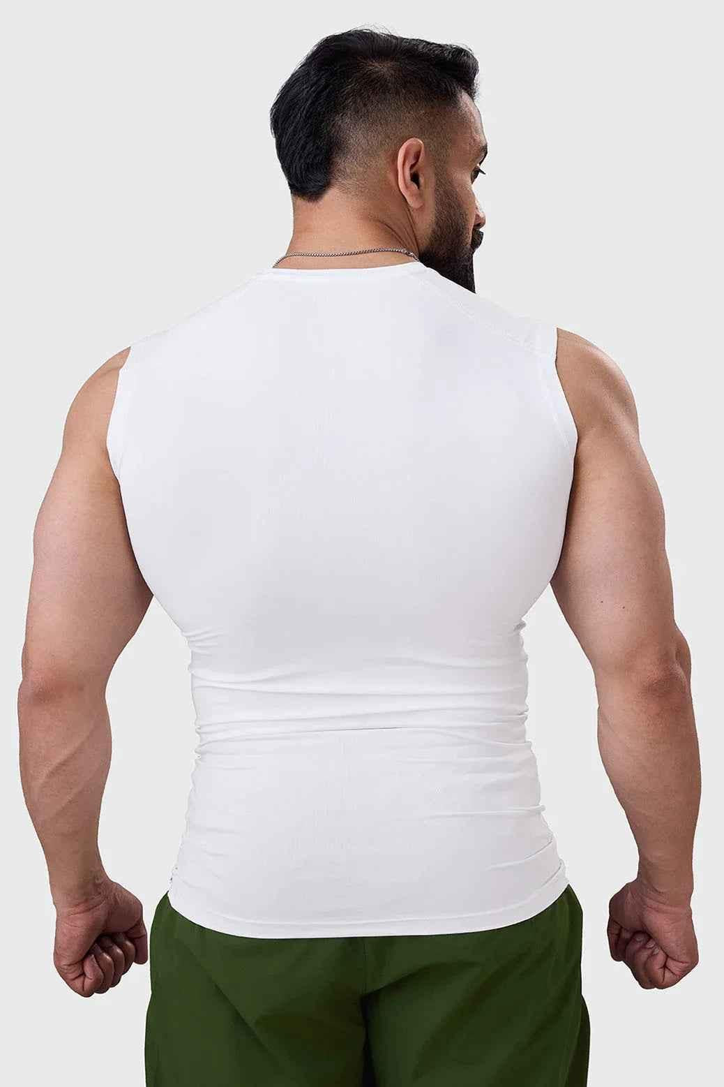 White compression sleeveless tank top by Fuaark Nz, designed for performance and athletic comfort.