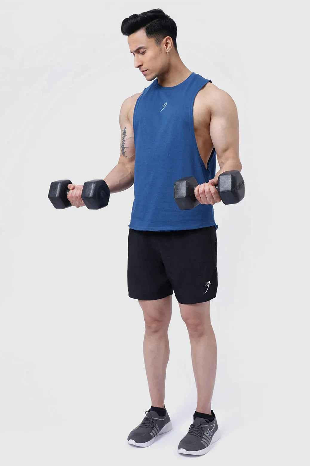 Teal Drift Deep Arm Tank Top by Fuaark Nz, sleeveless design, casual fit, perfect for active or everyday wear.