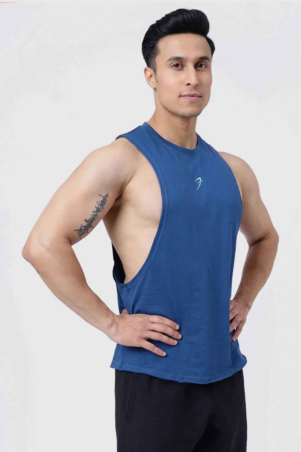 Teal Drift Deep Arm Tank Top by Fuaark NZ featuring a sleeveless design and casual fit for comfortable wear.