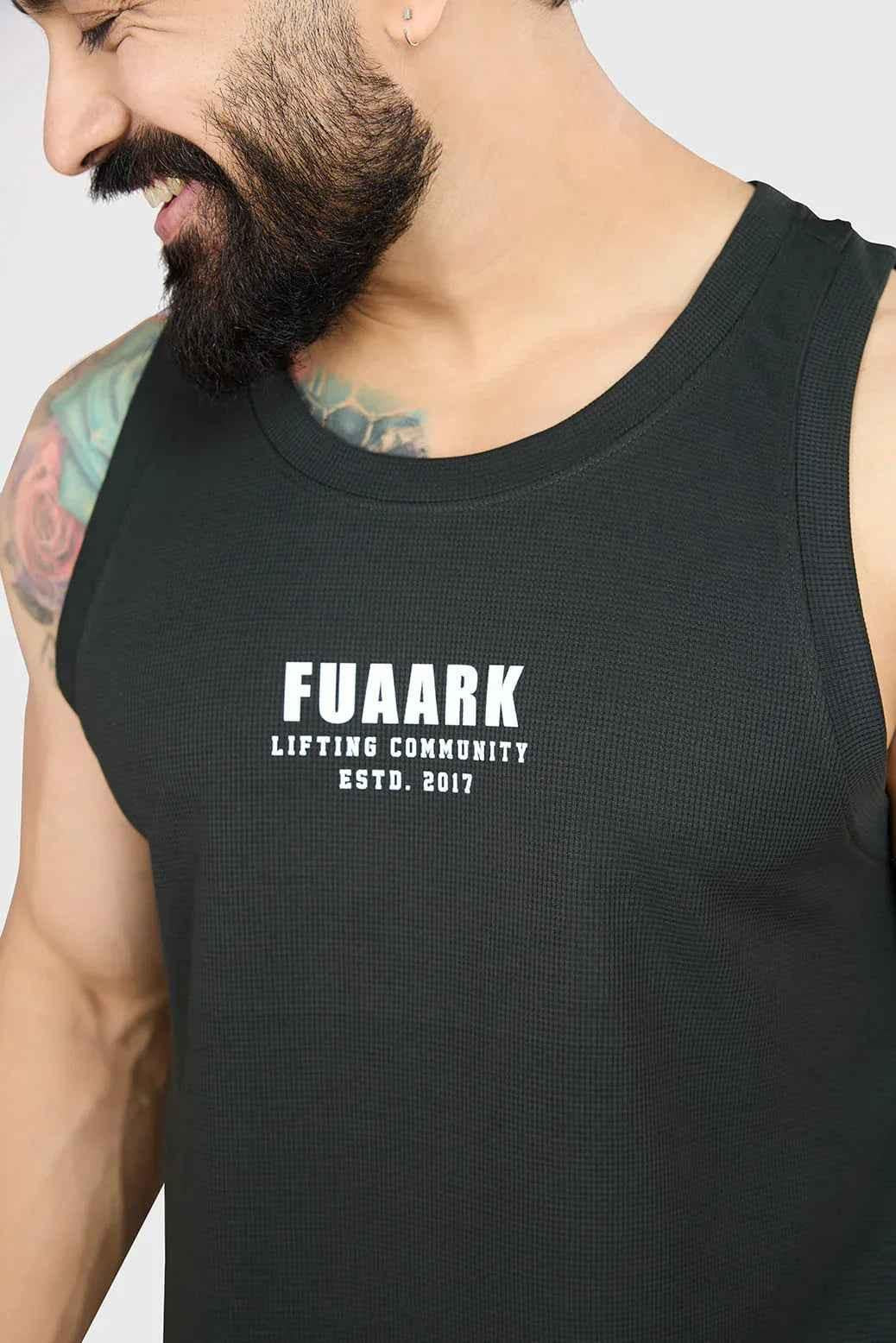 Fuaark Nz drip olive oversized tank top made of soft, breathable cotton with a relaxed fit, ideal for casual wear.