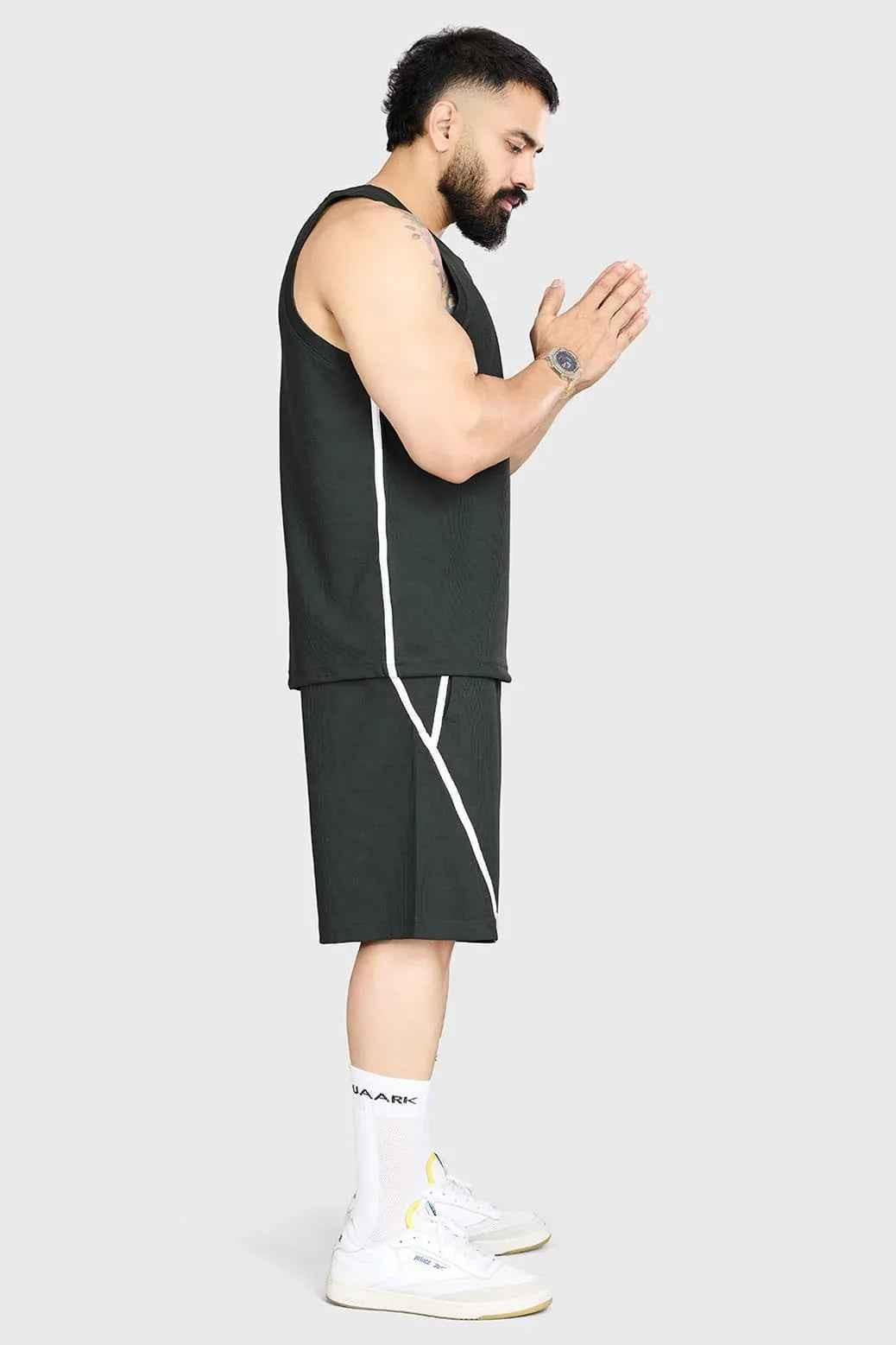 Fuaark Nz drip olive oversized tank top made of soft breathable cotton with a relaxed fit, ideal for casual wear.