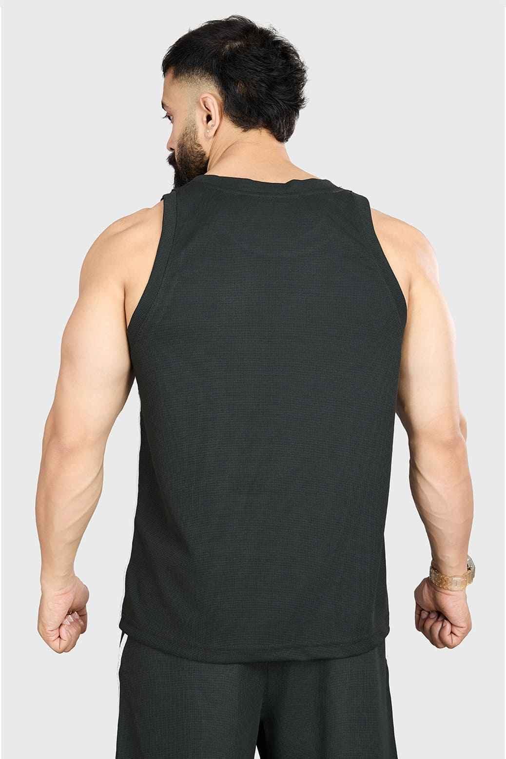 Fuaark NZ drip olive oversized tank top made of soft, breathable cotton with a relaxed fit, ideal for casual wear.