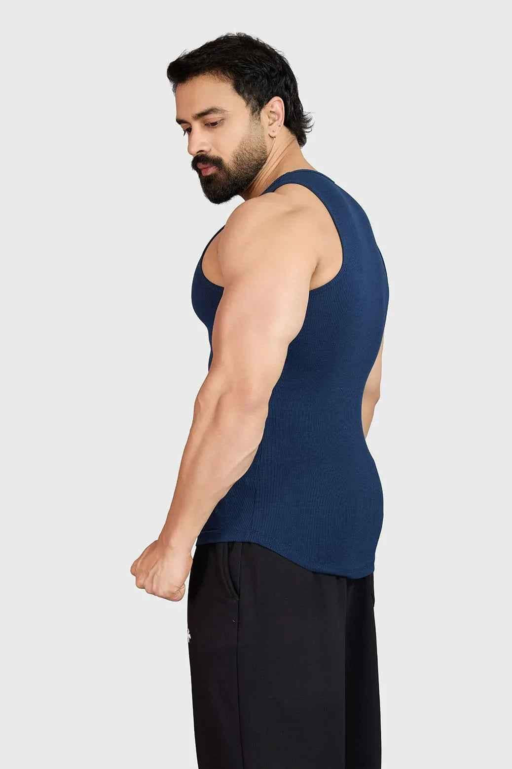 Ribbed navy tank top from Fuaark Nz, showcasing a fitted sleeveless design perfect for casual or layered outfits.
