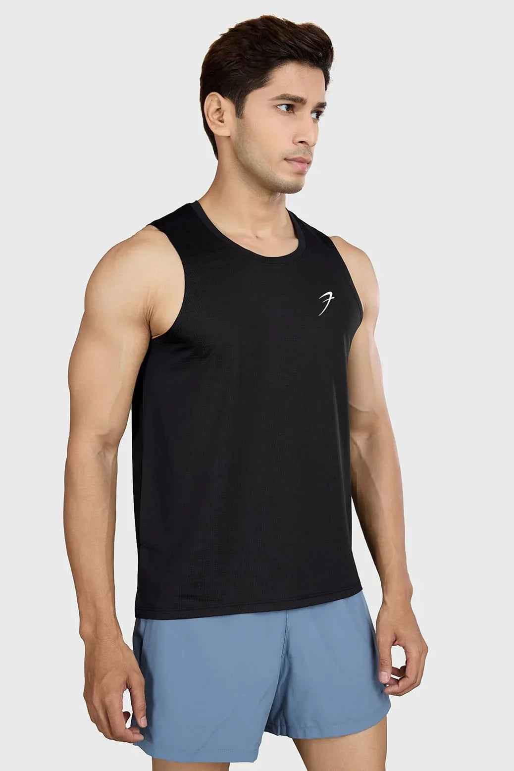 Black Ember Running Tank Top by Fuaark Nz, lightweight athletic tank with breathable fabric and racerback design.