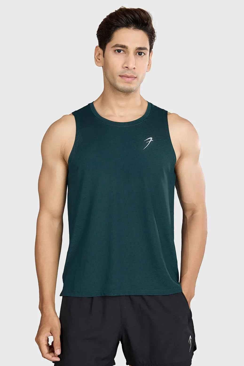 Fuaark Nz Ember Running Tank Top in bottle green, lightweight sleeveless athletic shirt for running and active wear.