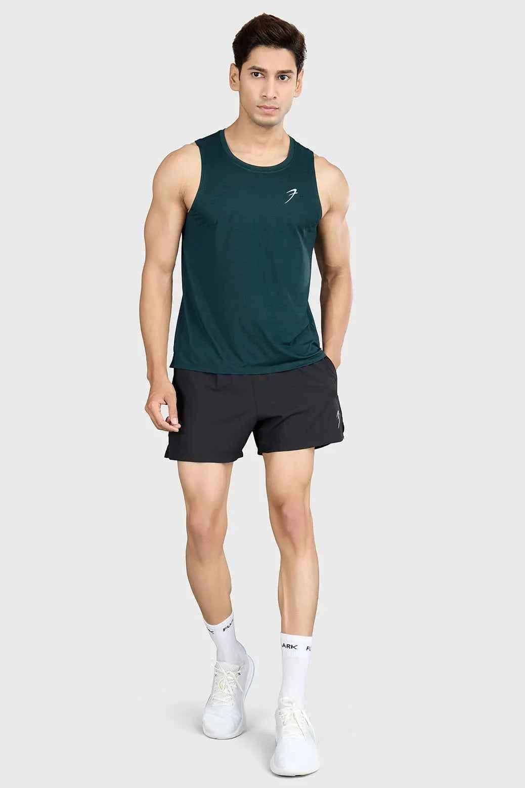 Fuaark Nz Ember Running Tank Top in bottle green, sleeveless athletic tank for running and activewear.