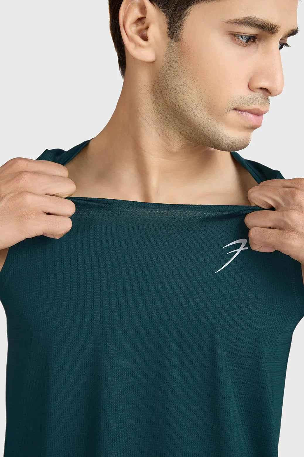 Fuaark Nz Ember Running Tank Top in Bottle Green, lightweight sleeveless athletic wear for training and running.
