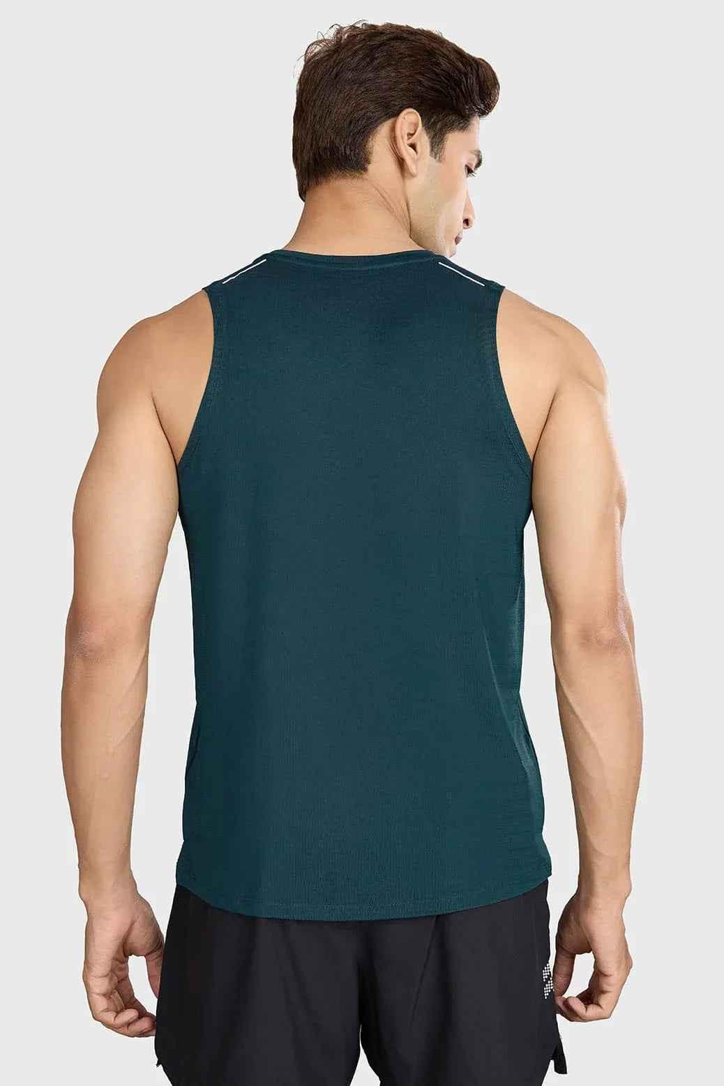 Fuaark NZ Ember Running Tank Top in Bottle Green, lightweight athletic tank for running and active wear.