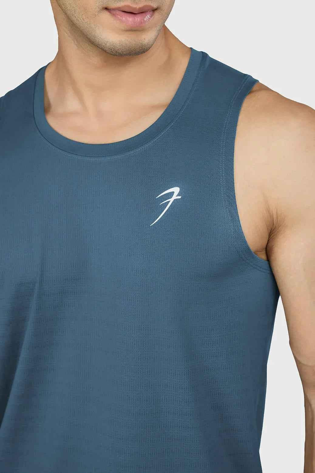 Light blue Ember Running Tank top by Fuaark NZ, sleeveless athletic tank with breathable fabric for active wear.