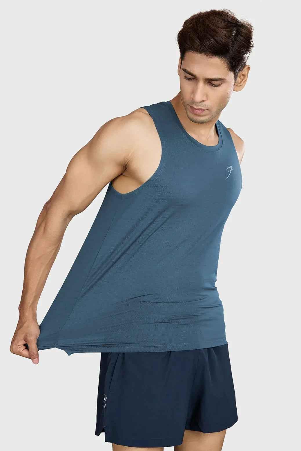 Light blue Ember Running Tank top by Fuaark Nz, sleeveless athletic tank with breathable fabric for running and workouts.