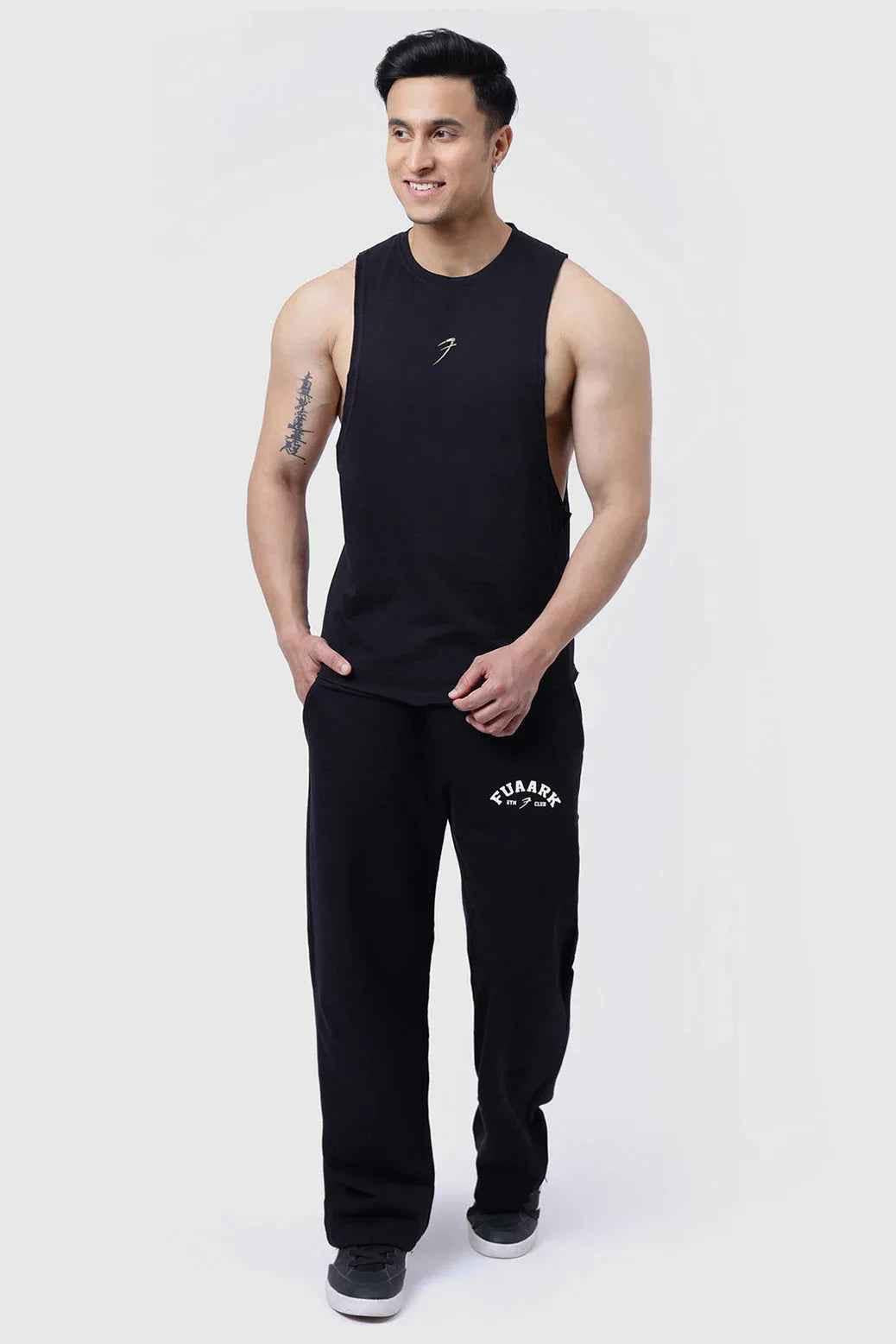 Fuaark Nz Drift Black Deep Cut Muscle Tank with deep armholes and moisture-wicking fabric for athletic wear.