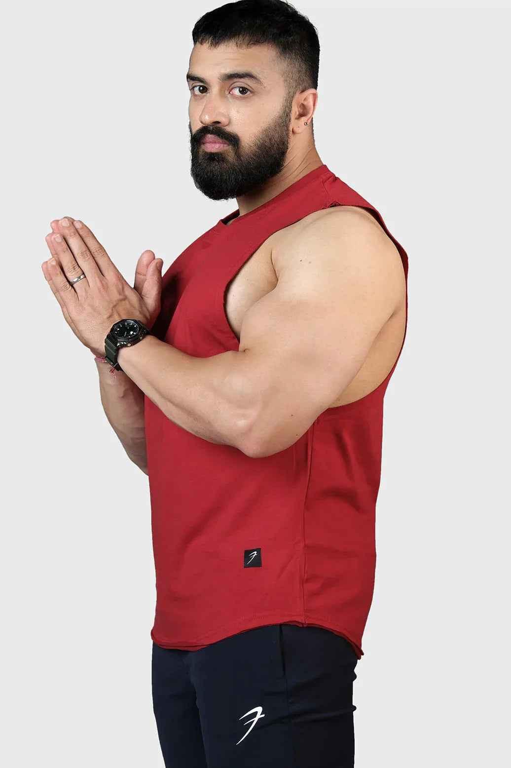 Fuaark Nz Legacy DeepArm tank top in maroon, stylish and comfortable activewear, shown on a model with a fitted design.
