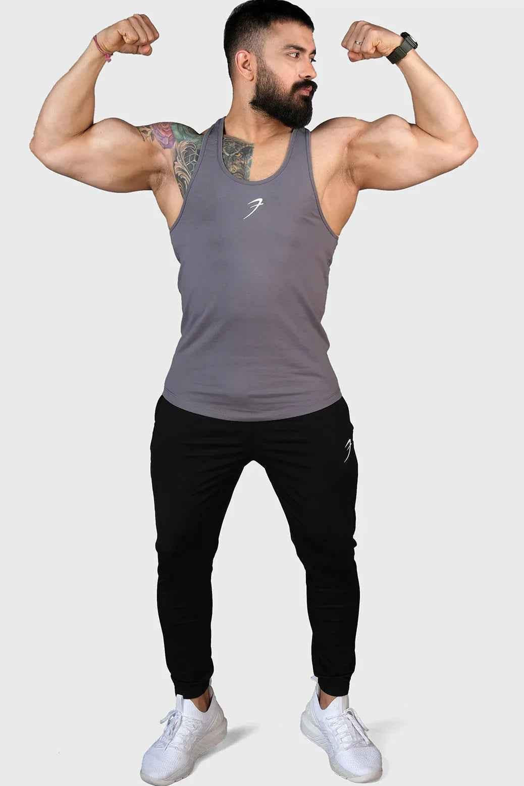Gray Legacy Stringer tank top by Fuaark Nz, featuring a fitted sleeveless design and lightweight fabric for active wear.