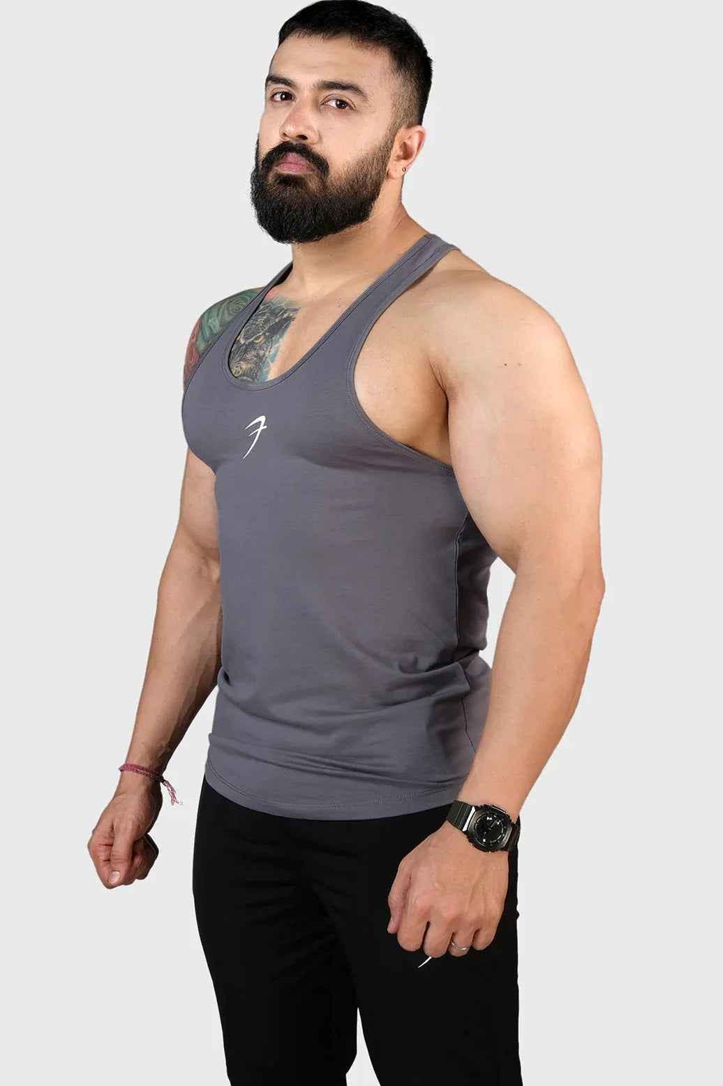 Grey Legacy Stringer tank top by Fuaark Nz, featuring a fitted design and sleeveless style for activewear or casual wear.