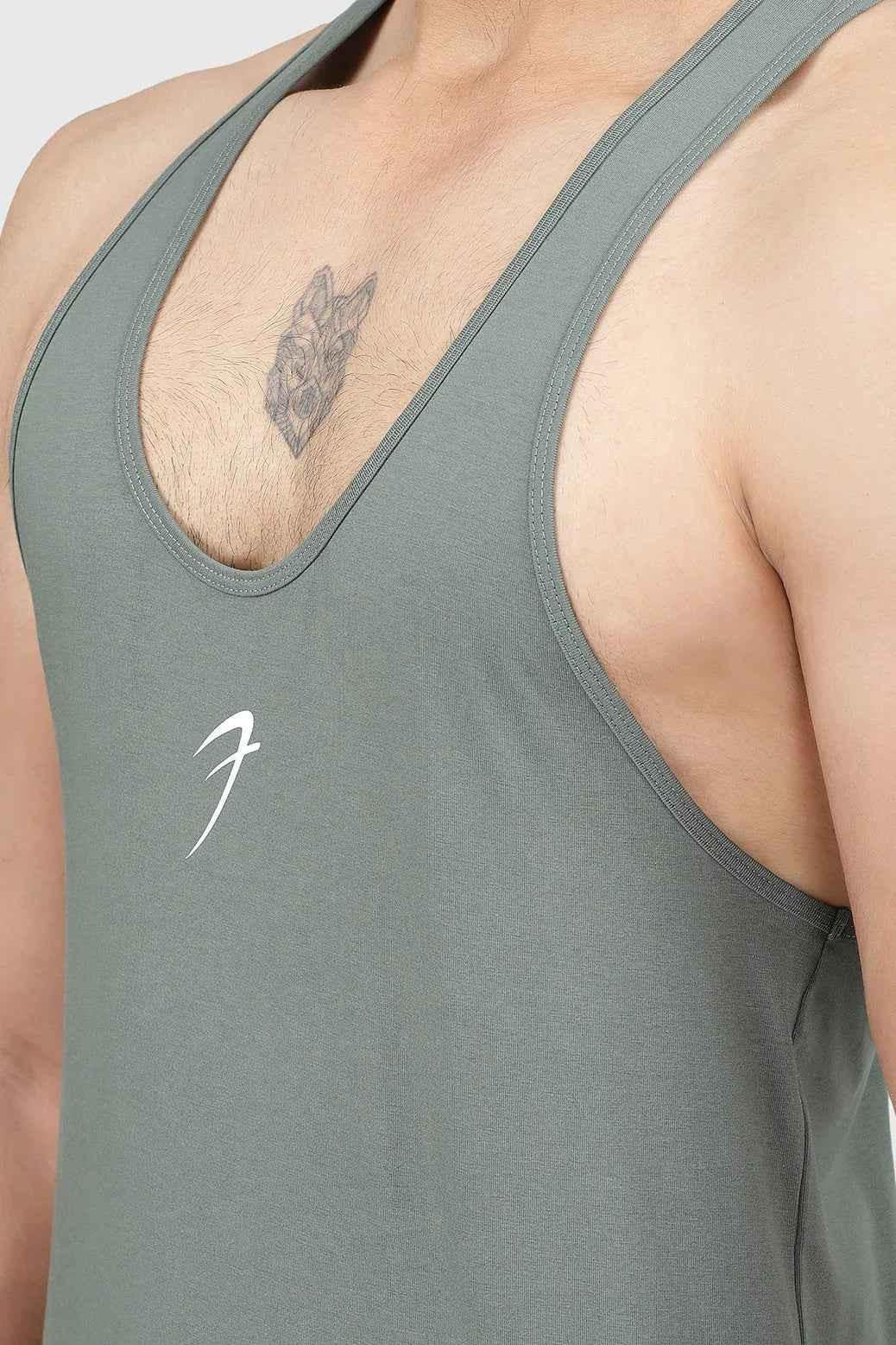 Men's sage green Fuaark Nz Legacy Stringer tank top for gym and training, featuring a fitted sleeveless design.