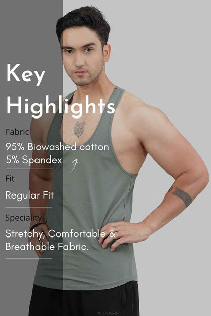 Men's sage green Fuaark Nz Legacy Stringer tank top, designed for gym and training, shown on a model.