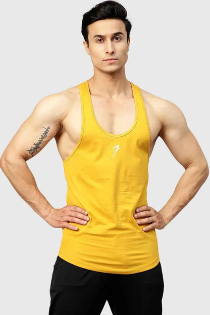 Fuaark Nz Legacy Stringer Mustard tank top displayed on a mannequin, highlighting its fitted style and vibrant mustard color.
