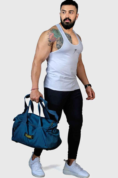 White Legacy Stringer tank top by Fuaark Nz, featuring a fitted design and sleeveless style for athletic wear.