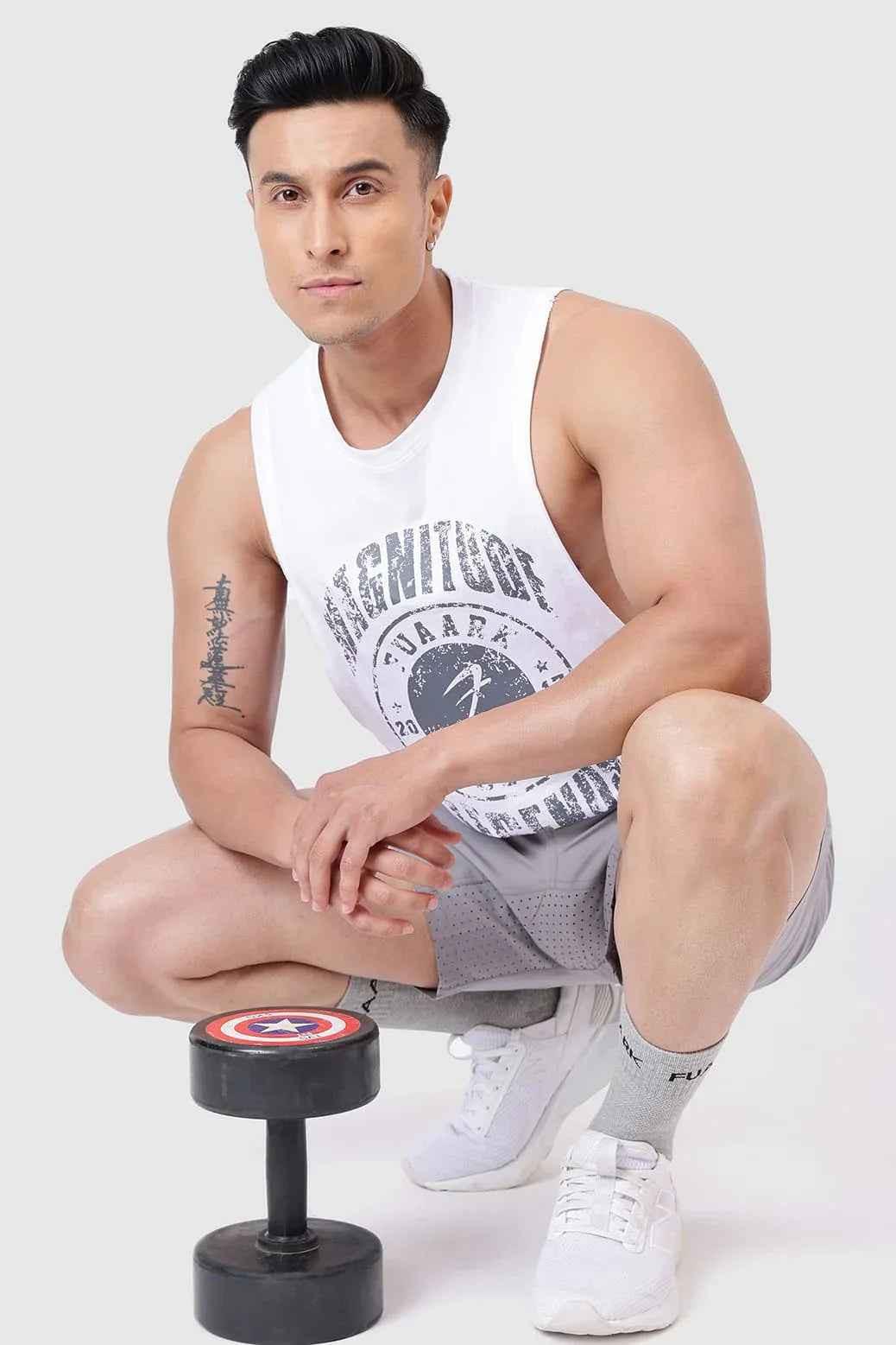 White Magnitude Deep Arm Tank Top by Fuaark Nz, sleeveless design, casual fit, displayed on a neutral background.
