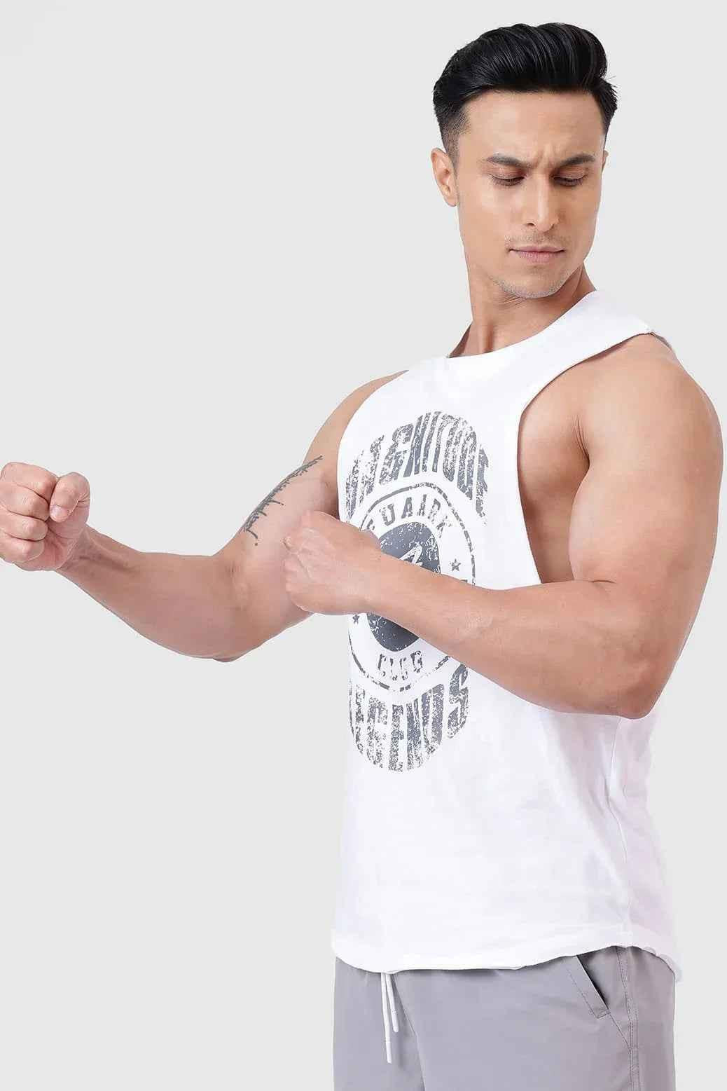 White Fuaark Nz Magnitude Deep Arm Tank top, sleeveless design, casual fit, perfect for active or everyday wear.