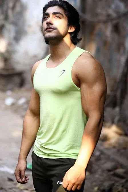 Men's lime tank top by Fuaark Nz, lightweight and stylish summer essential, shown on a model with a casual fit.