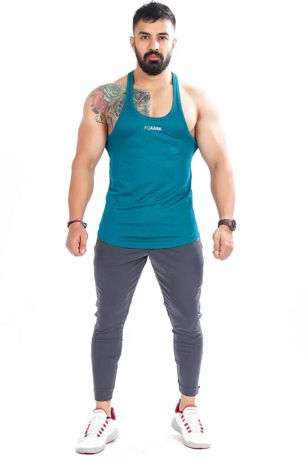 Teal mesh stringer tank top by Fuaark NZ, designed for comfort and style, shown on a plain background.