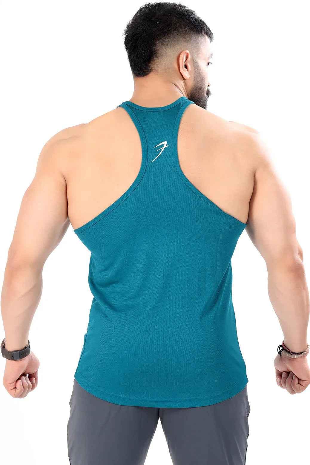Teal mesh stringer tank top by Fuaark NZ, designed for ultimate comfort and style, shown on a model.