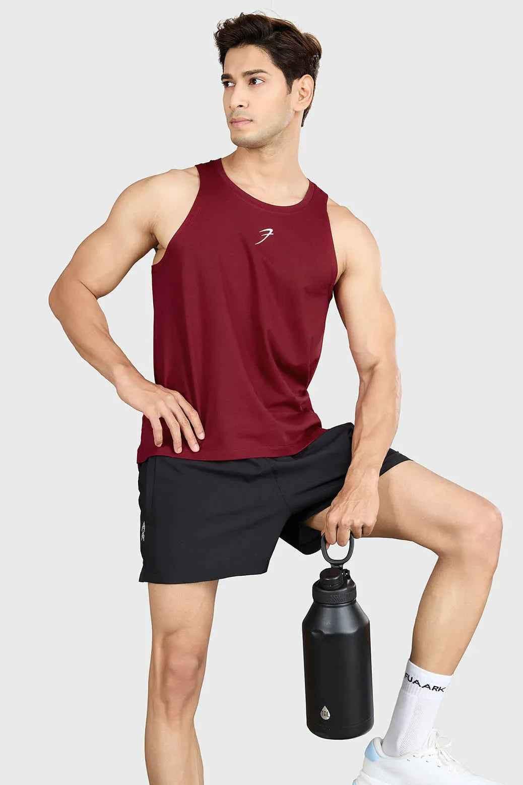 Deep red Pulse Running Tank top by Fuaark Nz, lightweight athletic sleeveless top for running and active wear.