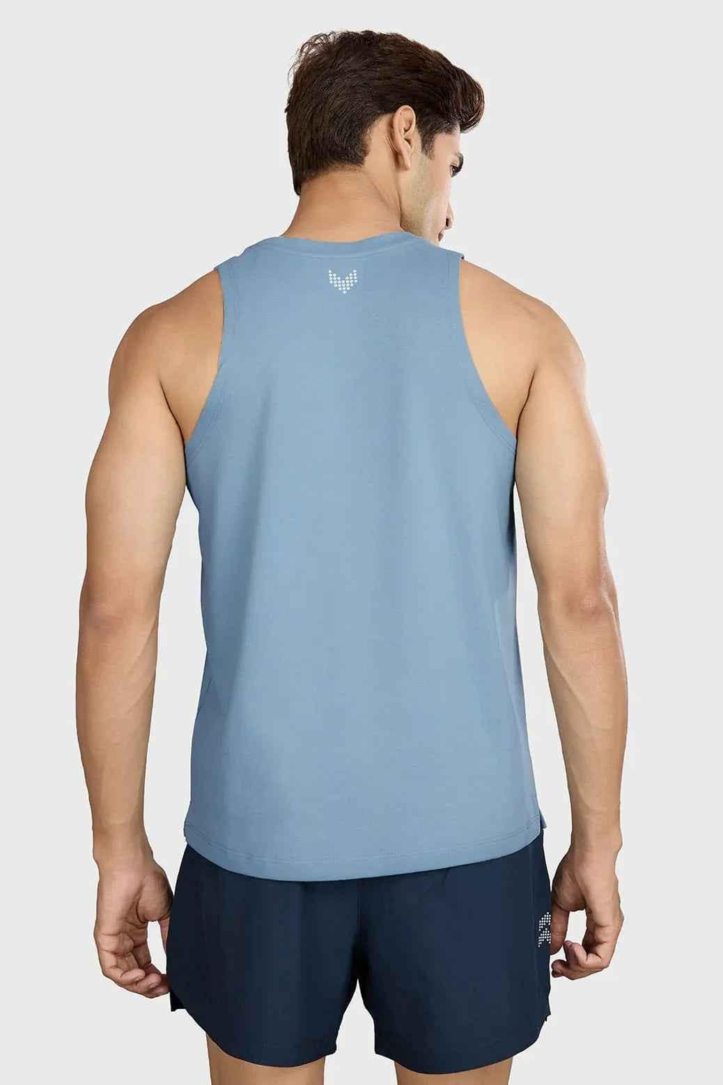 Light blue Pulse Running Tank Top by Fuaark NZ, made for comfortable athletic wear and active running sessions.