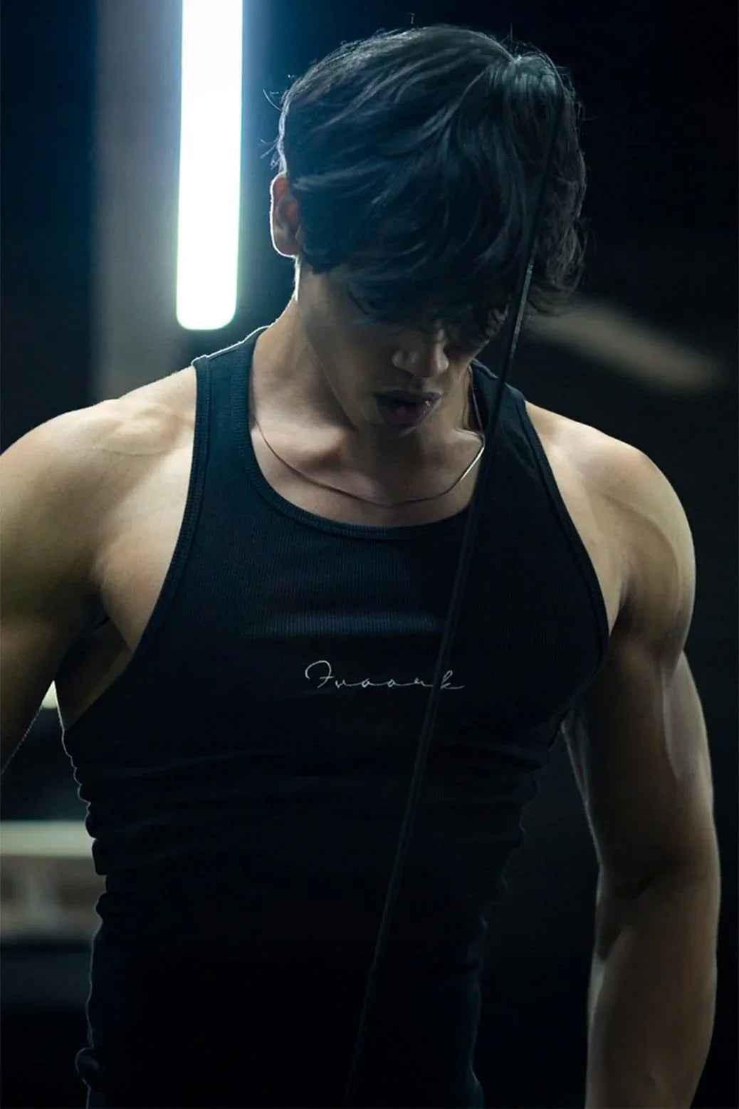 Black ribbed tank top from Fuaark Nz, showcasing a fitted, sleeveless design ideal for casual and stylish outfits.