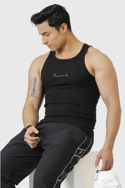 Black ribbed tank top from Fuaark Nz featuring a fitted design, perfect for casual and stylish everyday wear.