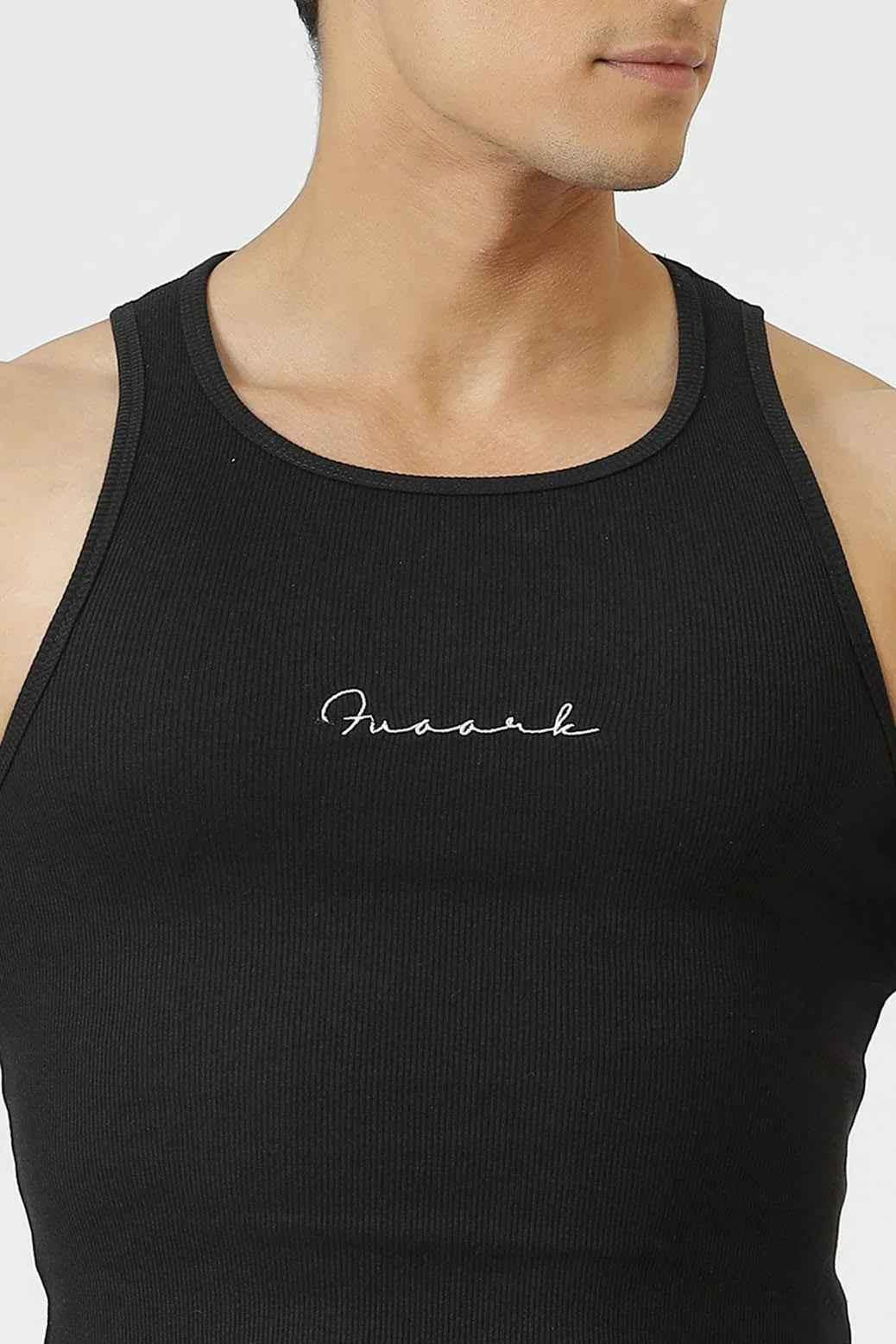 Ribbed black tank top by Fuaark Nz, featuring a fitted design and sleeveless style for effortless casual wear.