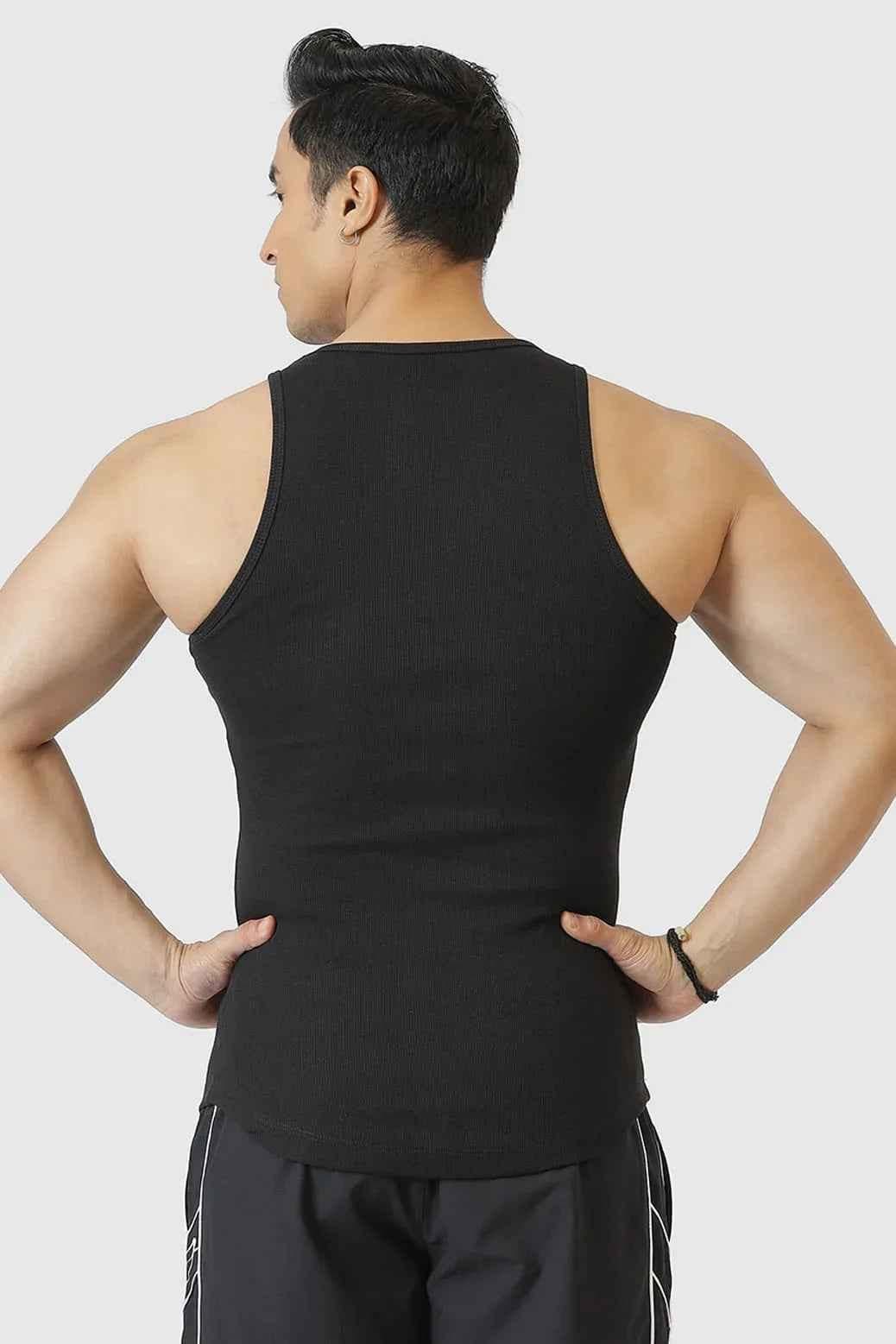 Black ribbed tank top from Fuaark Nz featuring a slim fit, sleeveless design, and versatile style for casual wear.