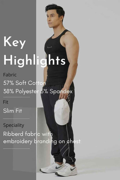 Ribbed black tank top for women by Fuaark Nz, showcasing a fitted, sleeveless design perfect for casual or stylish wear.