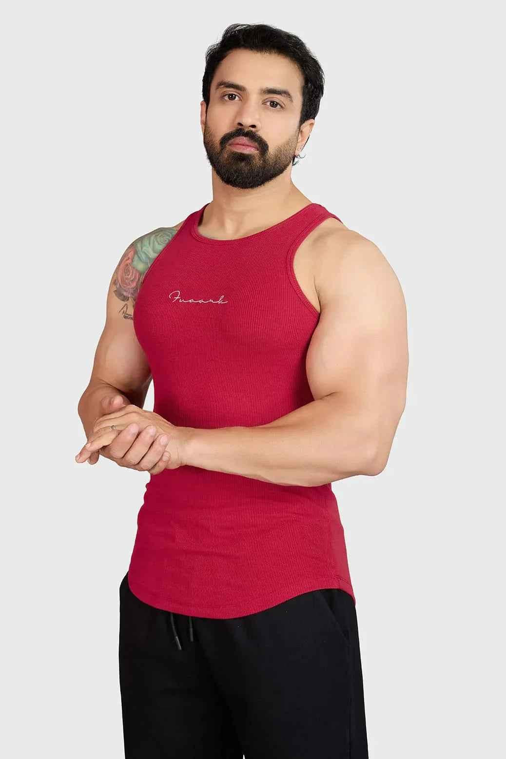 Red ribbed tank top from Fuaark Nz, stylish and comfortable casual wear, shown on a model.