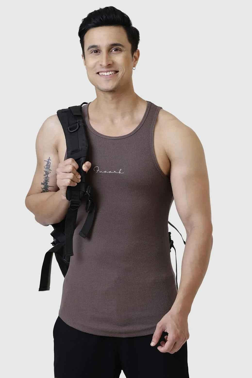 Brown ribbed tank top by Fuaark Nz, close-up of fitted tank top fabric and texture.